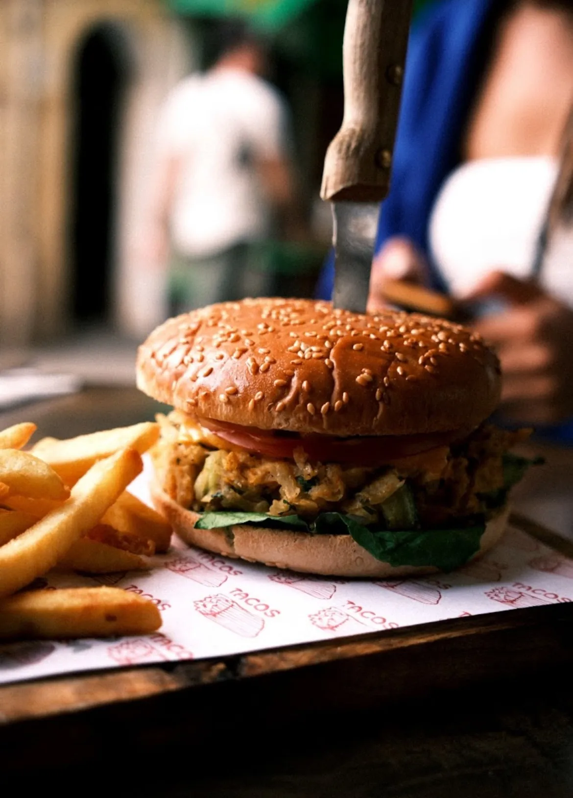 A Culture Box burger with sesame bun, lettuce, tomato and fries