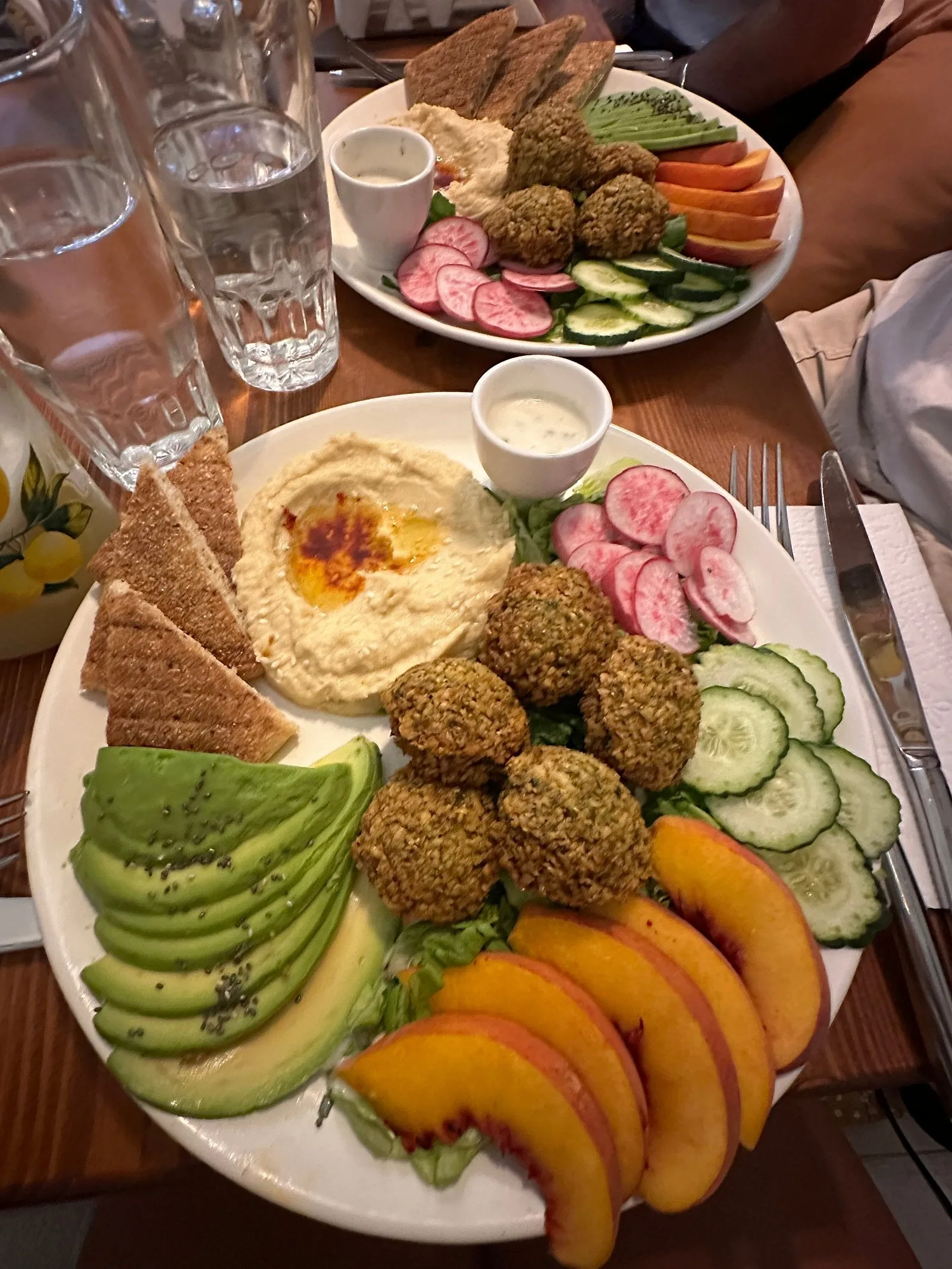 Moroccan starter salads at Culture Box — taktouka, zaalouk and olives in small plates